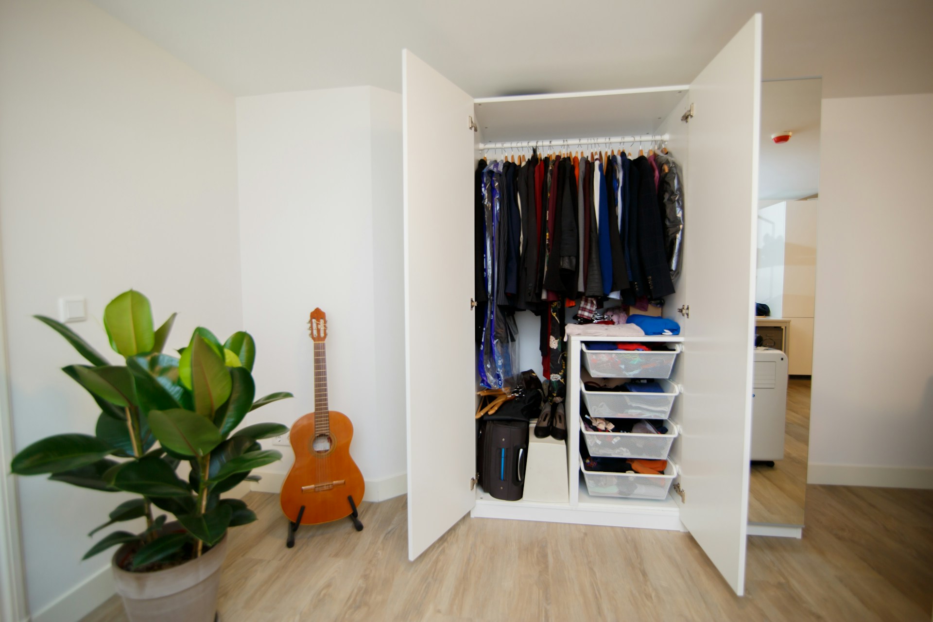 image of a clean closet; how to organize your closet